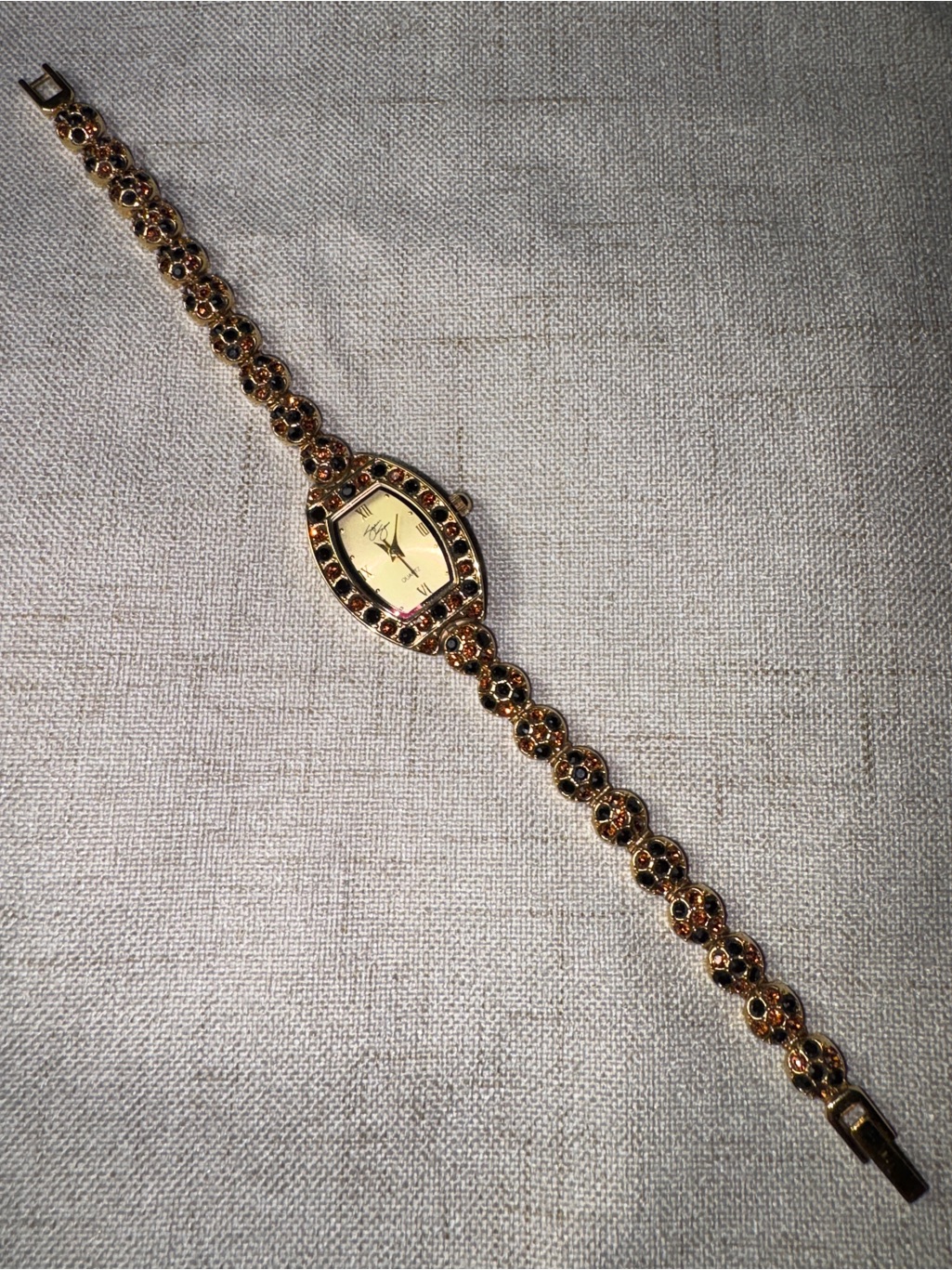GoldTone Garnet Accent Womens Bracelet Watch